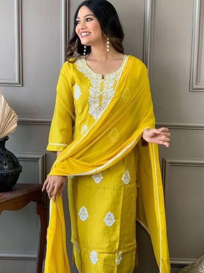 Brighten up your day with this yellow viscose chanderi kurta set. The white thread embroidery gives it a fresh, summery feel.