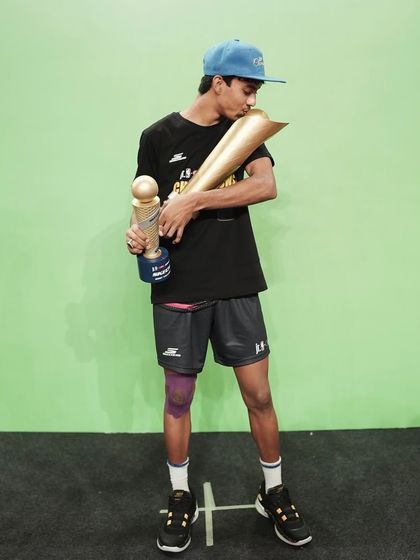 Kissing the trophy. A moment of pure joy and accomplishment after countless hours of practice.