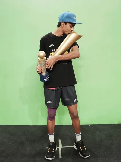 Kissing the trophy. A moment of pure joy and accomplishment after countless hours of practice.