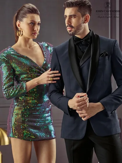 A campaign shoot for men's designer studio, Vicky Tailors. I created a glamorous, party-ready look for the female model and sharp, clean grooming for the male model to create a scene of evening elegance.