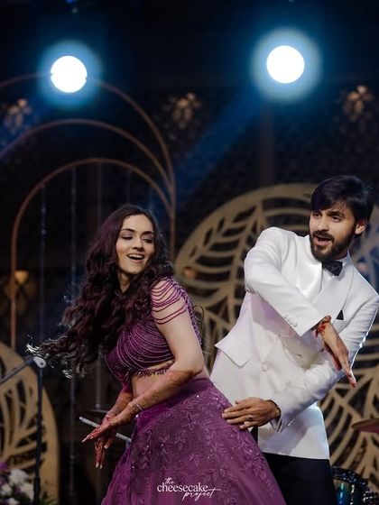 A fun, candid moment from the couple's choreographed Sangeet dance.