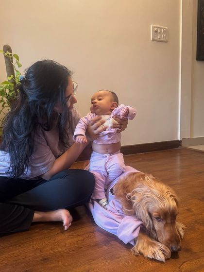 Twinning in matching purple outfits. These simple, coordinated moments create the cutest pictures.