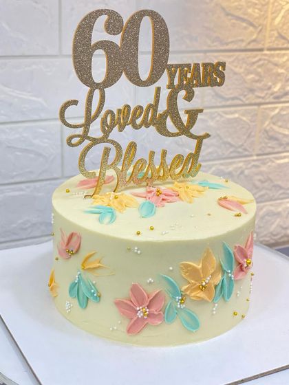 Another shot of the elegant 60th birthday cake.