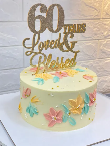 Another shot of the elegant 60th birthday cake.