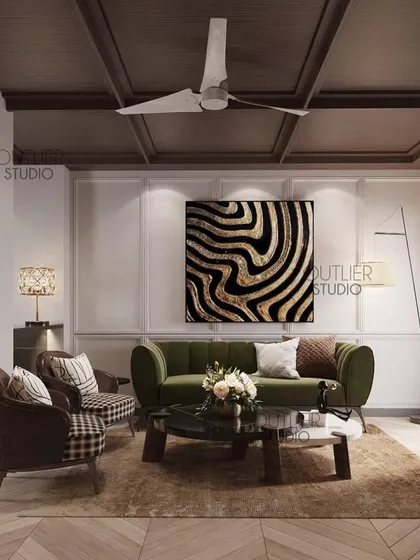 Lost in the pages with this enchanting library. The space doubles as a cozy lounge, with a deep green sofa, classic cabinetry, and a coffered ceiling, creating a perfect spot for reading and relaxing.