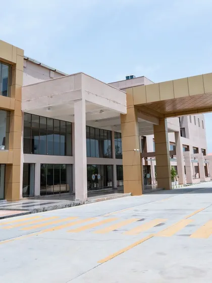 The entrance of a school is the gateway to its community. We designed this modern, impactful entrance for Konark Academy, featuring a strong architectural form with clean lines and a glass facade that signals a forward-thinking educational environment.
