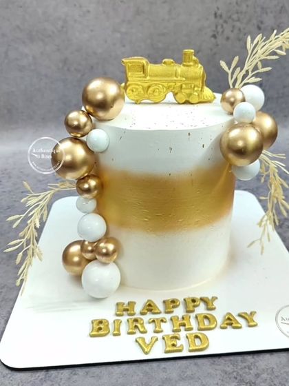 Another view of our elegant train engine cake, a perfect choice for a classy baby shower or birthday.