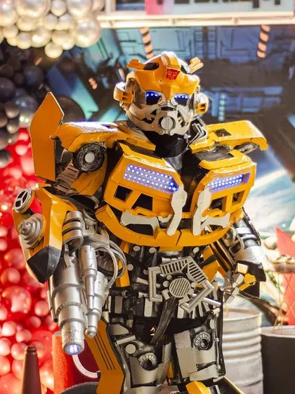 My parties go beyond just decor by including interactive elements like life-sized character mascots. This Bumblebee from our Transformers theme brings the action to life and creates unforgettable moments for the kids.