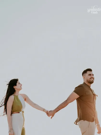 Walking hand in hand, with nothing but the open sky above. This minimalist shot from a Dubai pre-wedding session symbolizes the beginning of their journey together. It’s simple, powerful, and all about their connection.