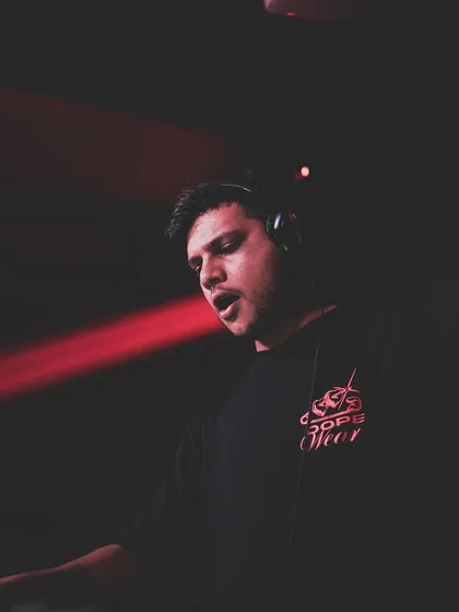 A close-up of me singing along while mixing, showing my passion and engagement.
