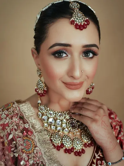 A happy and radiant bride. My goal is to teach you the skills to create looks that bring joy and confidence to your clients on their most important day.