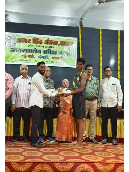 Celebrating the Best Player award at the U-17 competition.