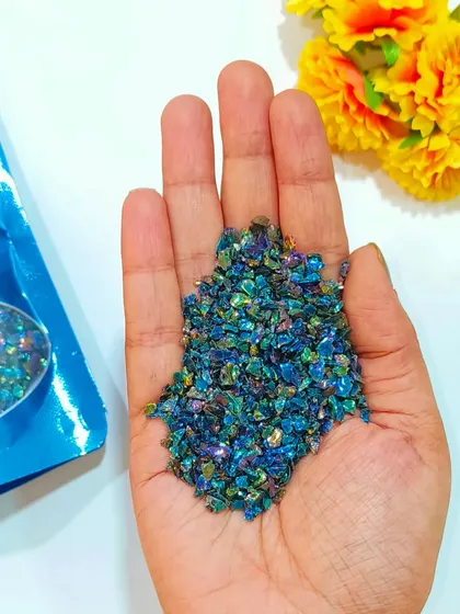 These multi-color holographic glass granules create a stunning iridescent effect in resin. They are perfect for geode art, coasters, or any project that needs a magical shimmer.