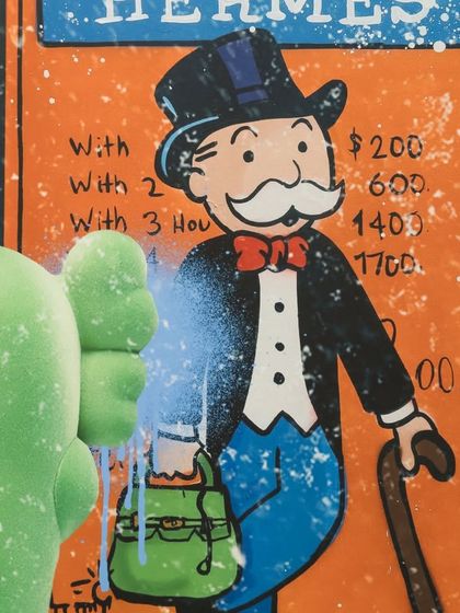 A detail from "The Museum Heist," featuring the Monopoly Man next to a Hermès price list, a witty commentary on art, value, and commerce.