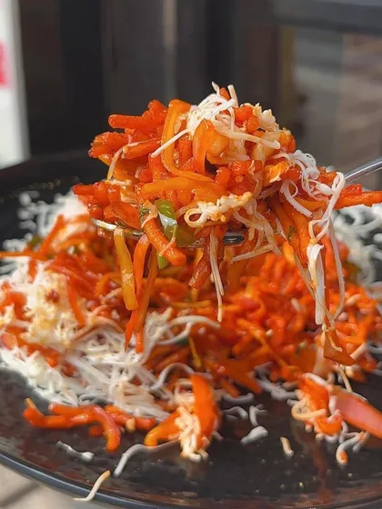 My Cheese Chinese Bhel is a delightful fusion snack. Crispy noodles are tossed in a tangy sauce and topped with a generous amount of cheese.