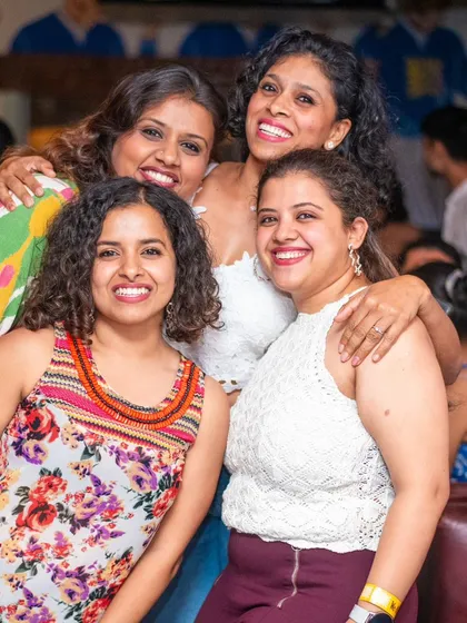 A beautiful group of friends smiling for the camera. This is what our community is all about: friendship and fun.