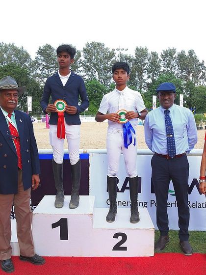 The podium for the FEI Jumping Children’s Classic. Hosting these events and seeing the next generation of talent succeed is a core part of my mission.
