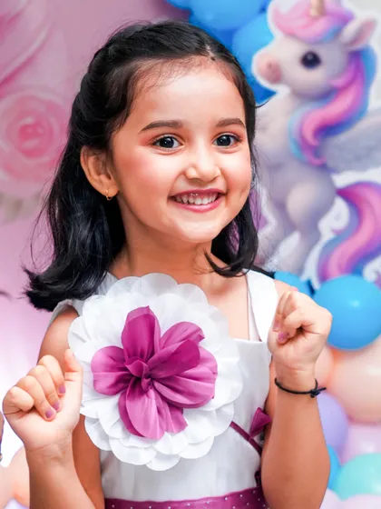 The birthday star's radiant smile says it all. Our goal is to capture that genuine happiness in beautiful, relaxed portraits you will cherish forever.