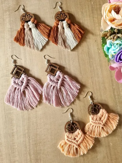 Elevate your style with our collection of macrame earrings. Featuring wooden elements like lotus cutouts and geometric shapes, these lightweight tassel earrings combine artisanal craftsmanship with a modern boho flair.
