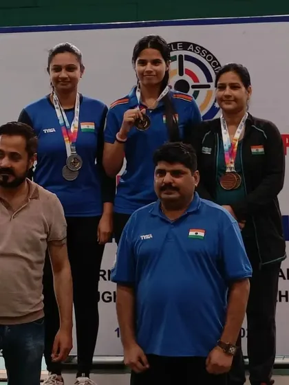 Standing with the winners on the podium. Being part of these official ceremonies reinforces the standards of excellence we uphold at our own academy.