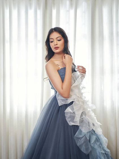 A closer look at the 'Ocean' gown, showing the texture of the detachable ruffled floral skirt. It's all about giving you options to play with.