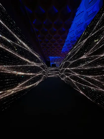 A dazzling walkway of endless lights. We use art, drama, and technology to create immersive experiences, like this tunnel of light that makes every step an enchanting journey. 🌟✨