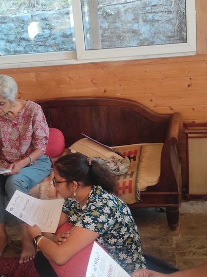 Participants in the Himalayan retreat studying materials during a quiet, reflective part of the course.