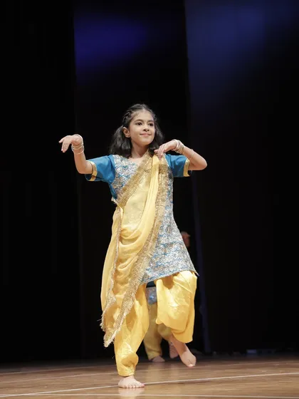 This performer captures the elegance of the routine. We focus on storytelling through dance, teaching students to convey emotion through their movements.