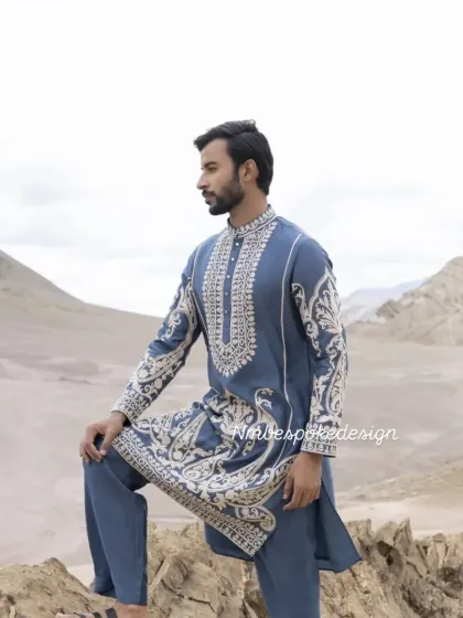 The full kurta set against a stunning natural landscape.