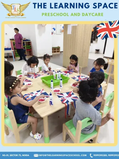 A wide view of our UK craft session shows a classroom buzzing with creativity. I provide all the materials needed for children to bring their artistic visions to life.