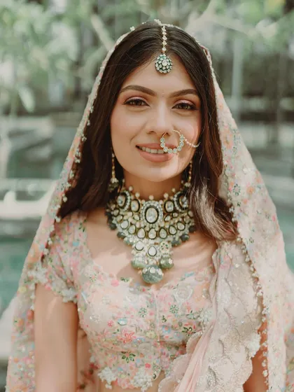 A close up of Tanisha's soft and dewy phera makeup. I focused on creating luminous skin and a gentle glow that looked fresh and natural for her daytime ceremony, perfectly complementing her pastel Anamika Khanna ensemble.