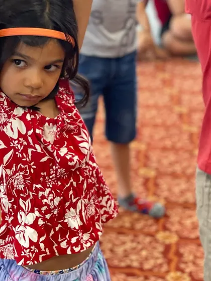 A candid moment of a young participant during our workshop in the U.S. It's wonderful to see children from different backgrounds connect with Indian culture.