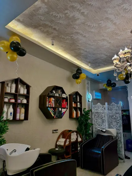 Our hair wash and treatment area is fully stocked with professional-grade products to address every hair type and concern. The space is designed for both function and comfort.