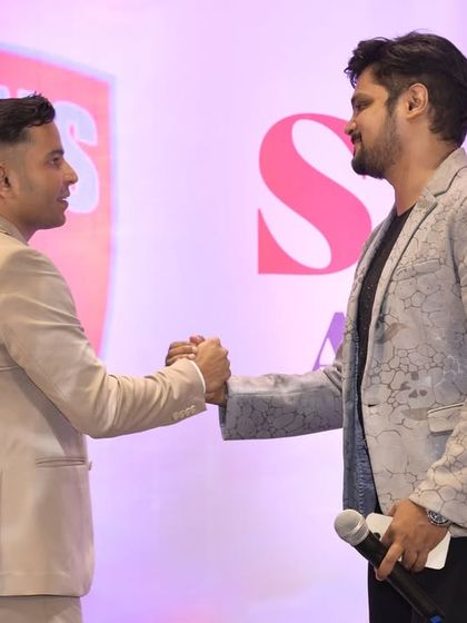 A handshake signifying a successful partnership and event. I work closely with event organizers to ensure their vision for the night is executed perfectly.