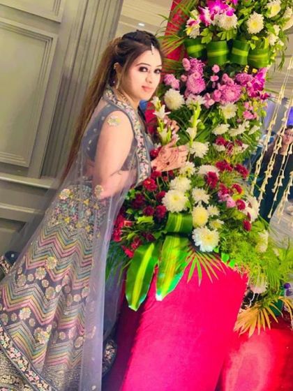 A lovely grey lehenga with multi-color thread work. This rental is a great option for someone who wants a subtle base with pops of color.