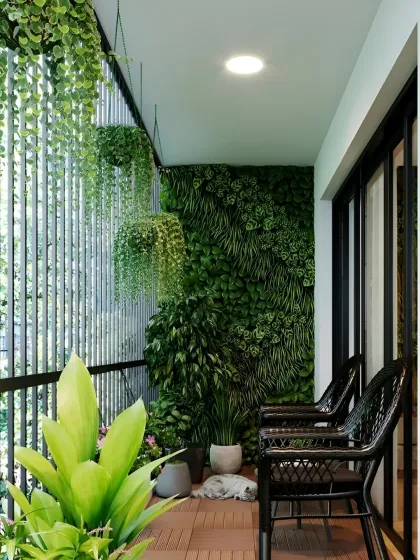We created a private jungle feel on this balcony with a dense vertical garden and hanging plants. The dark wicker chairs provide a perfect spot to sit back and feel completely immersed in greenery.