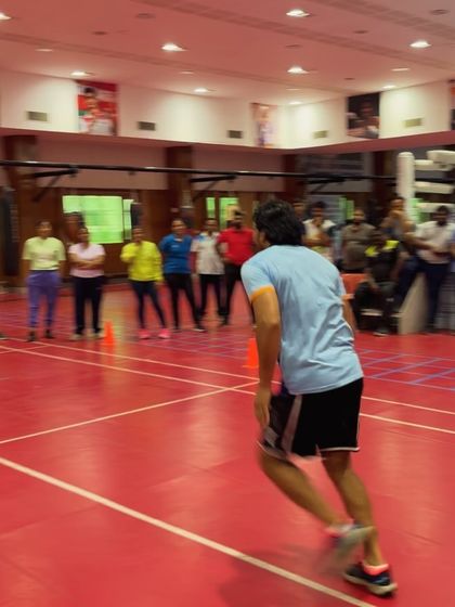 Demonstrating an agility drill during a workshop. The goal is to bridge the gap between science and practical, on-field coaching.