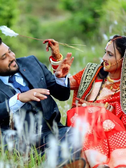 A playful and spontaneous moment between a couple during their outdoor shoot. We encourage couples to be themselves, which results in the most natural photos.