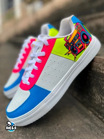 A side view of the boombox-themed Campus sneaker, showing how the neon colors make the design pop.