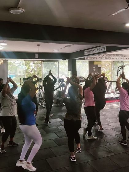 A silhouette shot of our dance class. The focus is on moving your body and feeling the music.