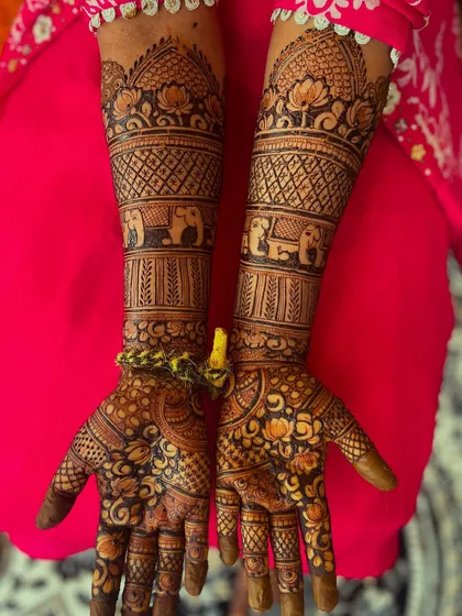 Beyond florals, I love creating traditional Indian bridal designs. This one features classic elements like elephants and lotus motifs, perfect for a Hindu wedding ceremony.