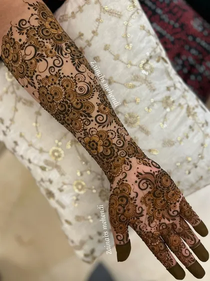 One of my favorite full-arm designs, featuring a delicate and flowing pattern of swirls and floral motifs.