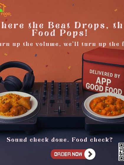 Where the beat drops, the food pops. This image of food on a DJ turntable shows that we're ready to turn up the flavor for your party.