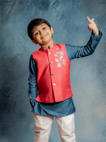 A full-length view of our red and blue lotus Bundi set. The vibrant colors and happy model make this a perfect image to showcase our festive collection.