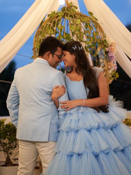 An intimate forehead-to-forehead pose that radiates love. This maternity photo beautifully captures the excitement of expecting parents.