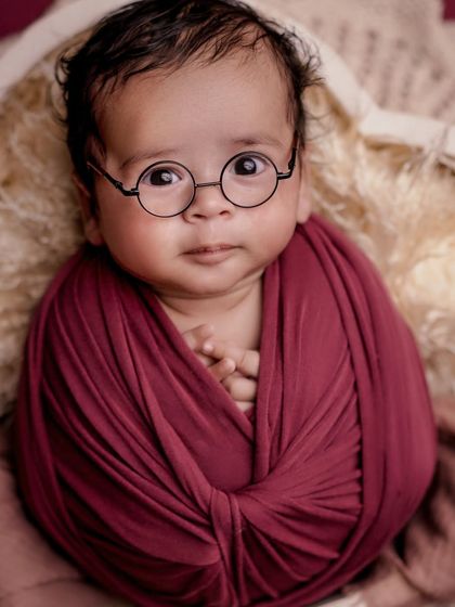 So much personality in such a tiny person. This awake shot with the little glasses is a perfect example of capturing your baby's budding character.