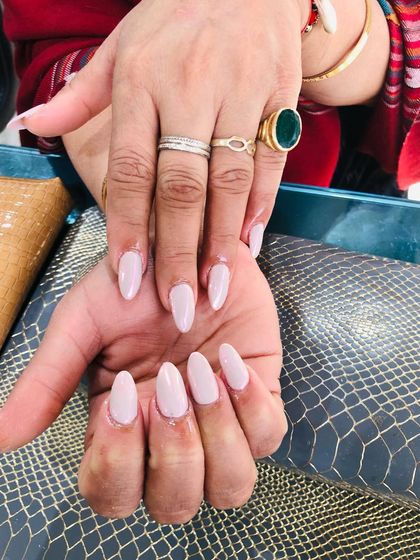 Another view of the elegant pearl chrome nails.