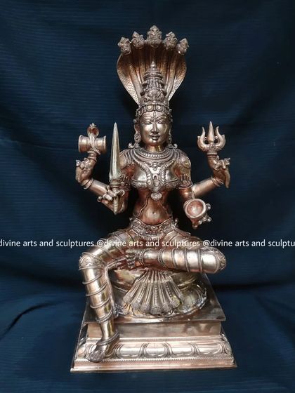 An 18-inch Panchaloha Mariamman, ready for shipping. The craftsmanship ensures that every detail, from her expression to her weapons, is perfectly rendered.