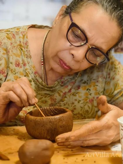 A participant carefully adds texture to the inside of her bowl. Our instructors guide everyone through different techniques to help them achieve their desired look.
