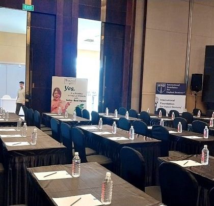 The hall is set for a multi-day conference, with every seat perfectly aligned and ready for attendees. My on-site execution ensures the venue is consistently maintained throughout the event.